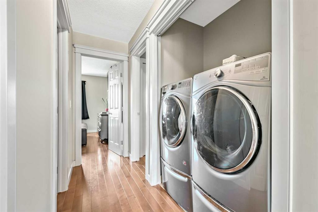 13 Dain Place Nw, Langdon, AB - Indoor Photo Showing Laundry Room