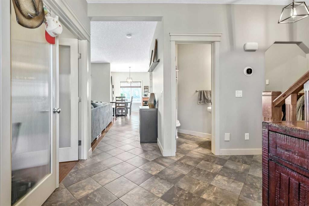 13 Dain Place Nw, Langdon, AB - Indoor Photo Showing Other Room