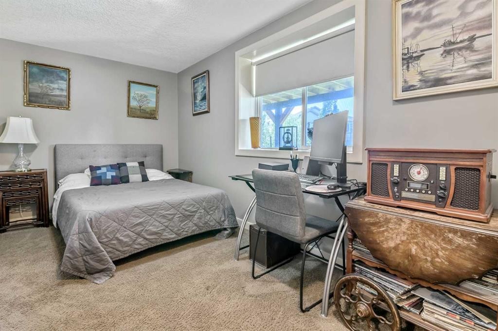 13 Dain Place Nw, Langdon, AB - Indoor Photo Showing Bedroom