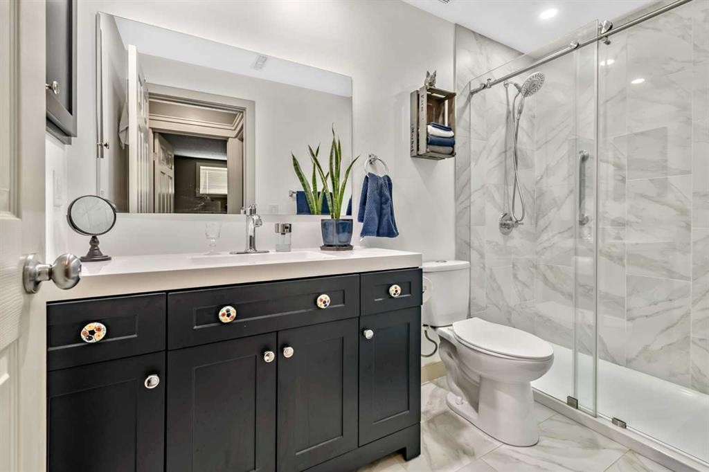 13 Dain Place Nw, Langdon, AB - Indoor Photo Showing Bathroom