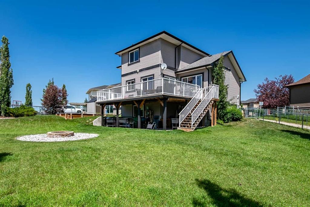 13 Dain Place Nw, Langdon, AB - Outdoor With Deck Patio Veranda
