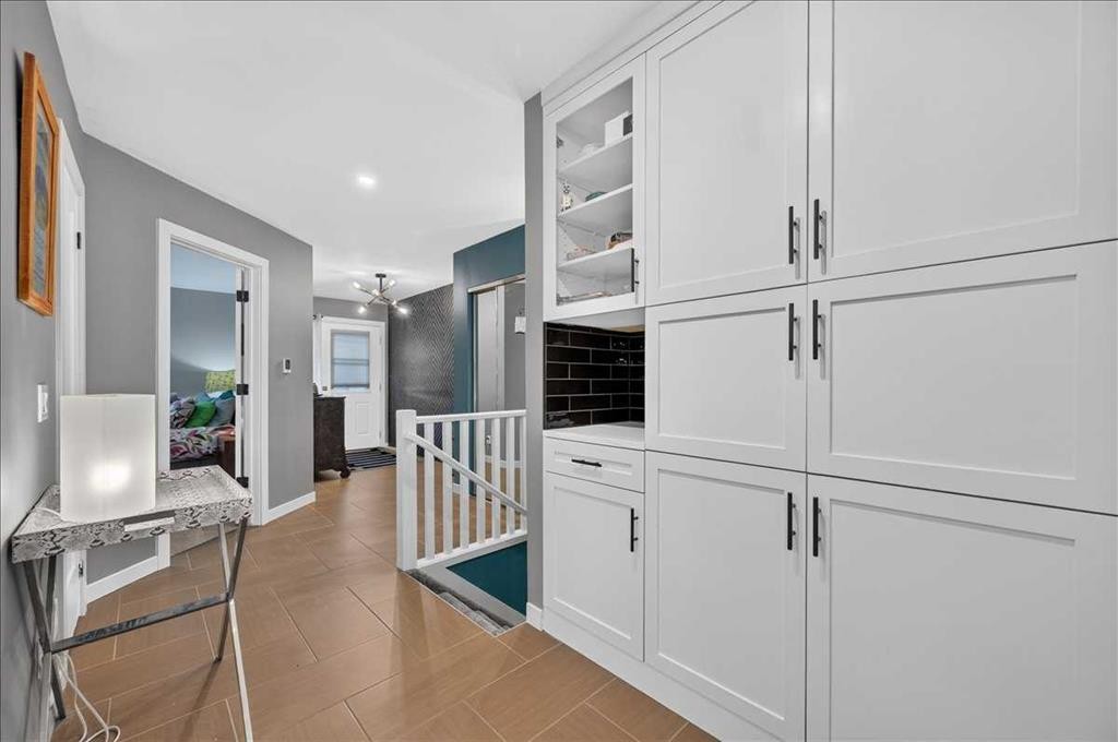 23-33 Stonegate Drive Nw, Airdrie, AB - Indoor Photo Showing Other Room