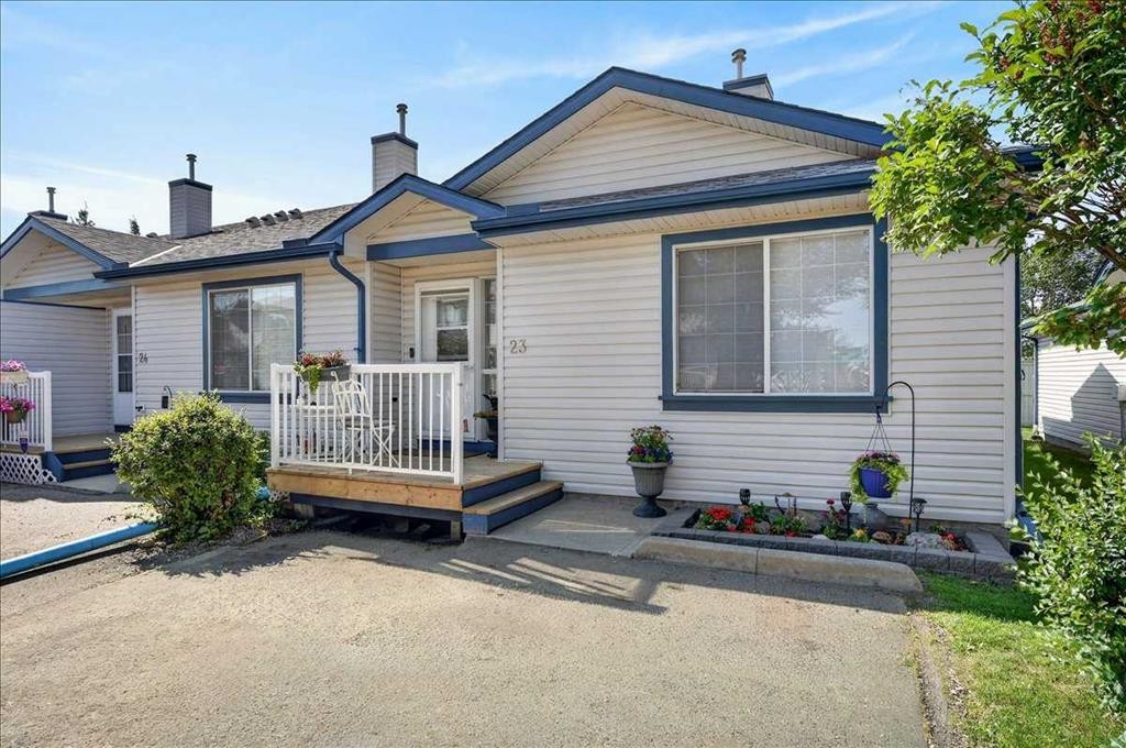 23-33 Stonegate Drive Nw, Airdrie, AB - Outdoor With Deck Patio Veranda