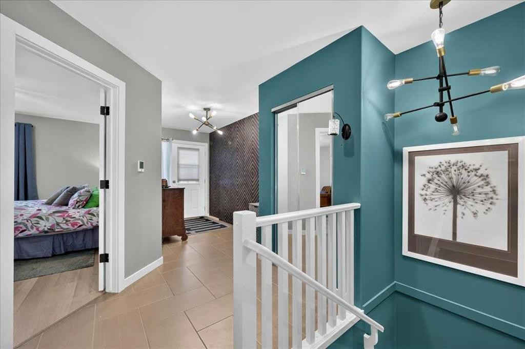 23-33 Stonegate Drive Nw, Airdrie, AB - Indoor Photo Showing Other Room