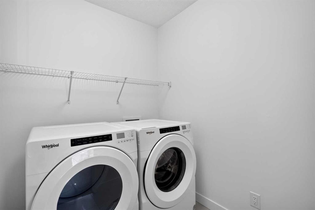 48 Willow Green Sw, Airdrie, AB - Indoor Photo Showing Laundry Room