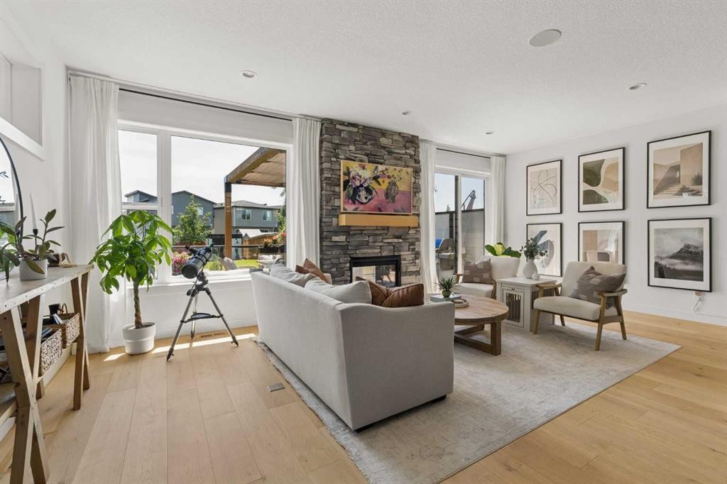 203 Cranbrook Park Se, Calgary, AB - Indoor Photo Showing Living Room With Fireplace