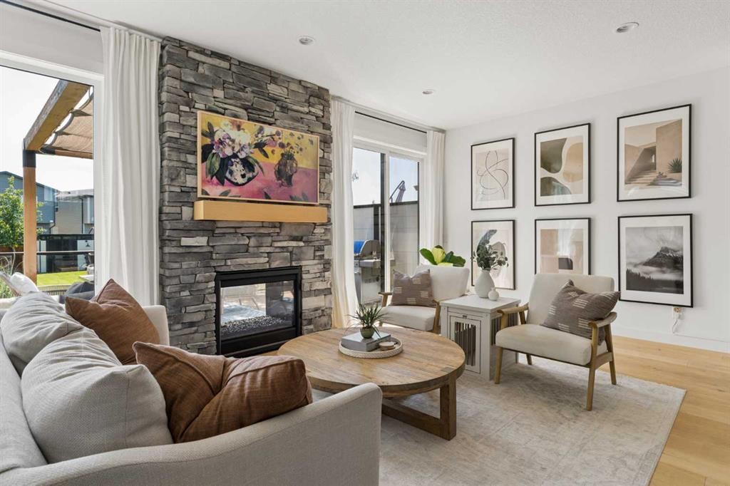 203 Cranbrook Park Se, Calgary, AB - Indoor Photo Showing Living Room With Fireplace