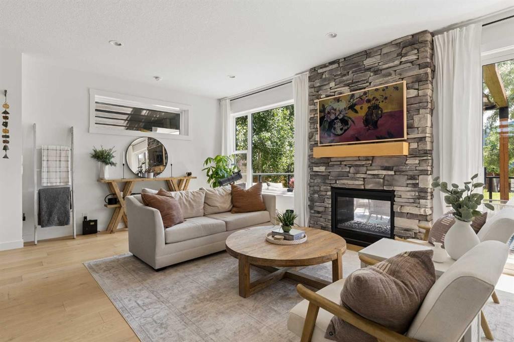 203 Cranbrook Park Se, Calgary, AB - Indoor Photo Showing Living Room With Fireplace