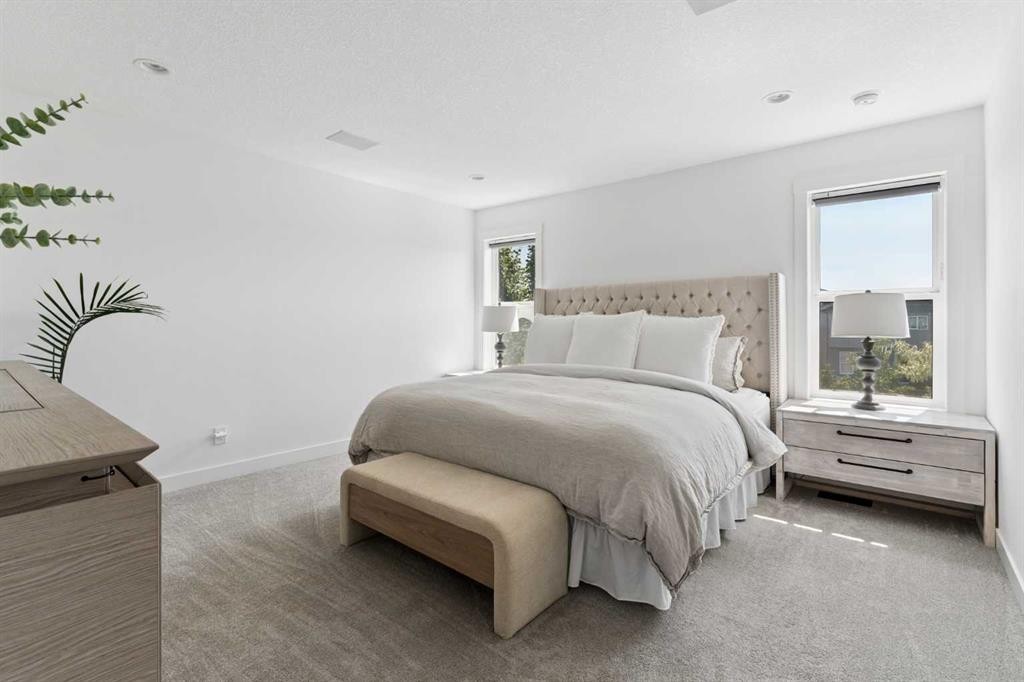 203 Cranbrook Park Se, Calgary, AB - Indoor Photo Showing Bedroom