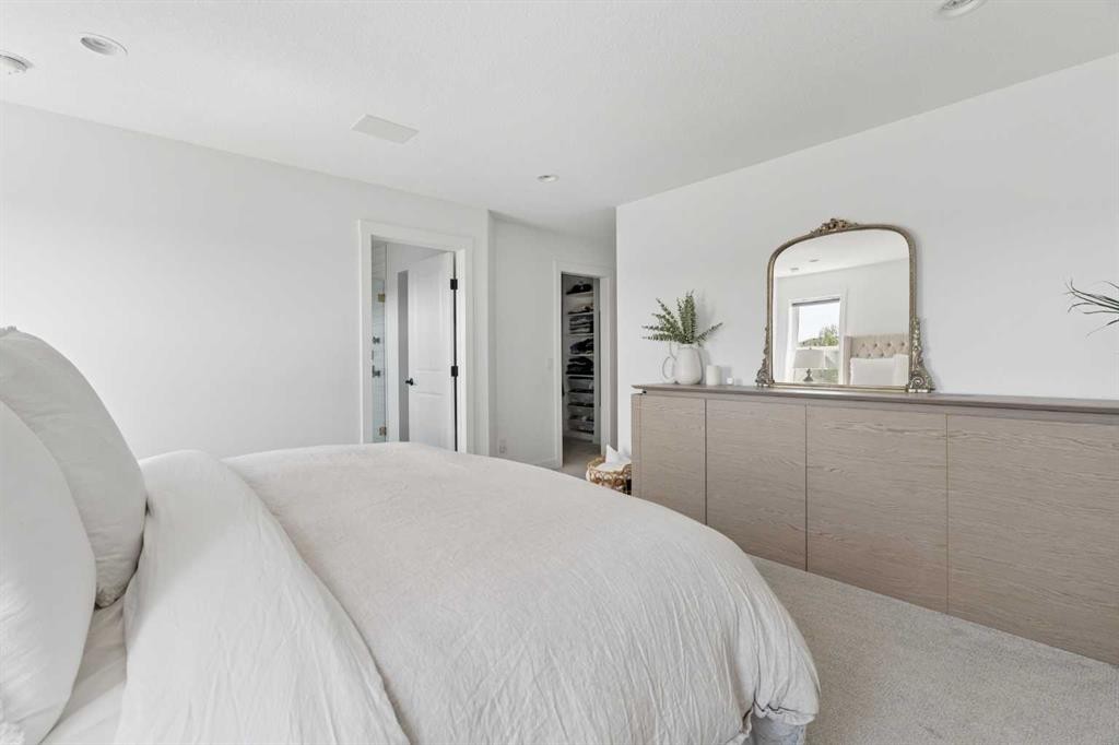 203 Cranbrook Park Se, Calgary, AB - Indoor Photo Showing Bedroom