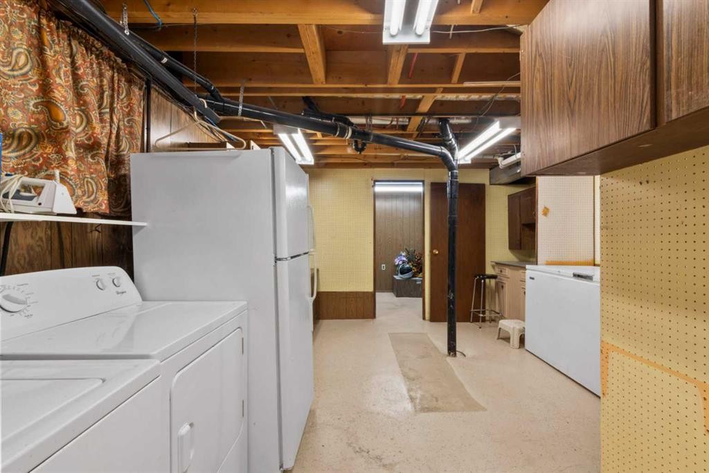 6832 Huntchester Road Ne, Calgary, AB - Indoor Photo Showing Laundry Room