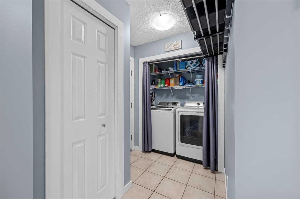 109 Hidden Valley Grove Nw, Calgary, AB - Indoor Photo Showing Laundry Room