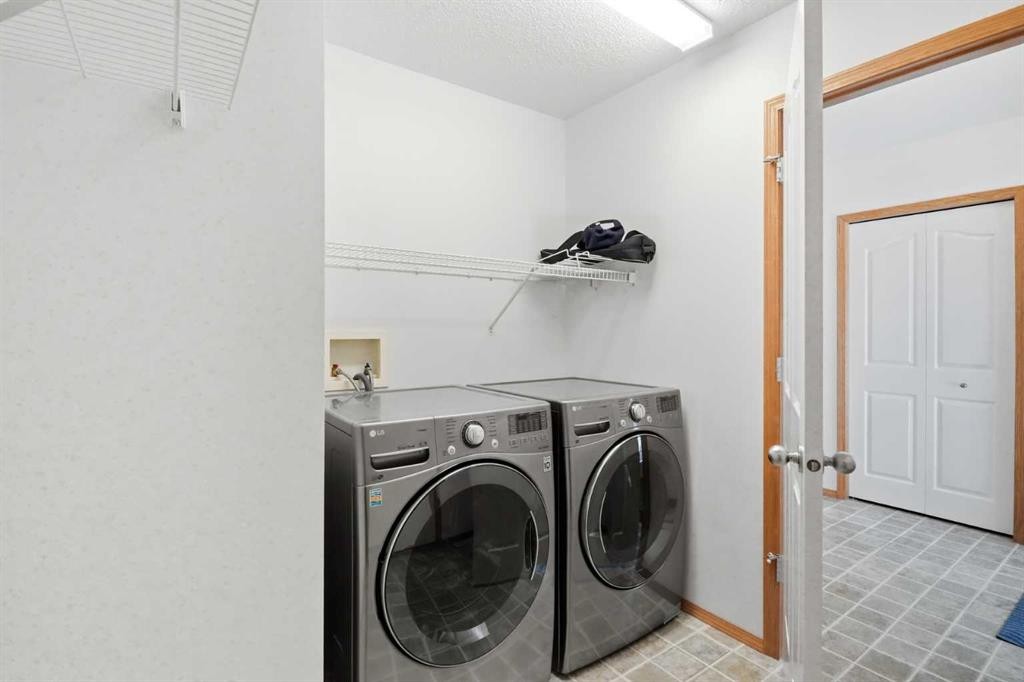 288 Springborough Way Sw, Calgary, AB - Indoor Photo Showing Laundry Room