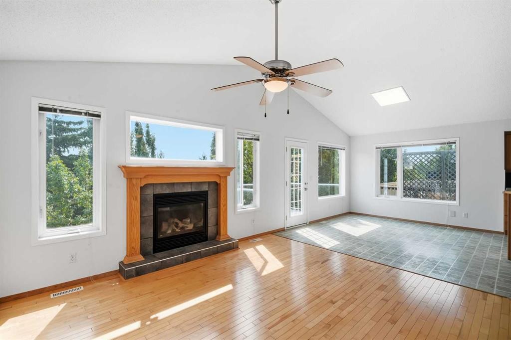288 Springborough Way Sw, Calgary, AB - Indoor Photo Showing Living Room With Fireplace
