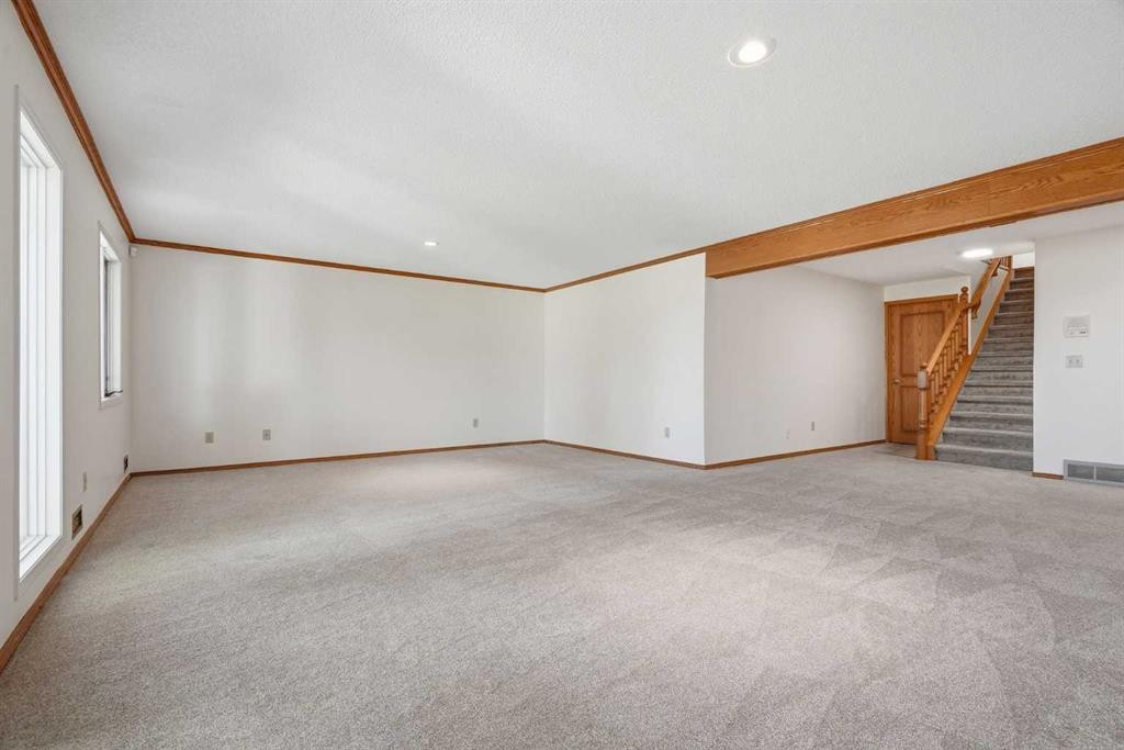 135 Shawnee Rise Sw, Calgary, AB - Indoor Photo Showing Other Room