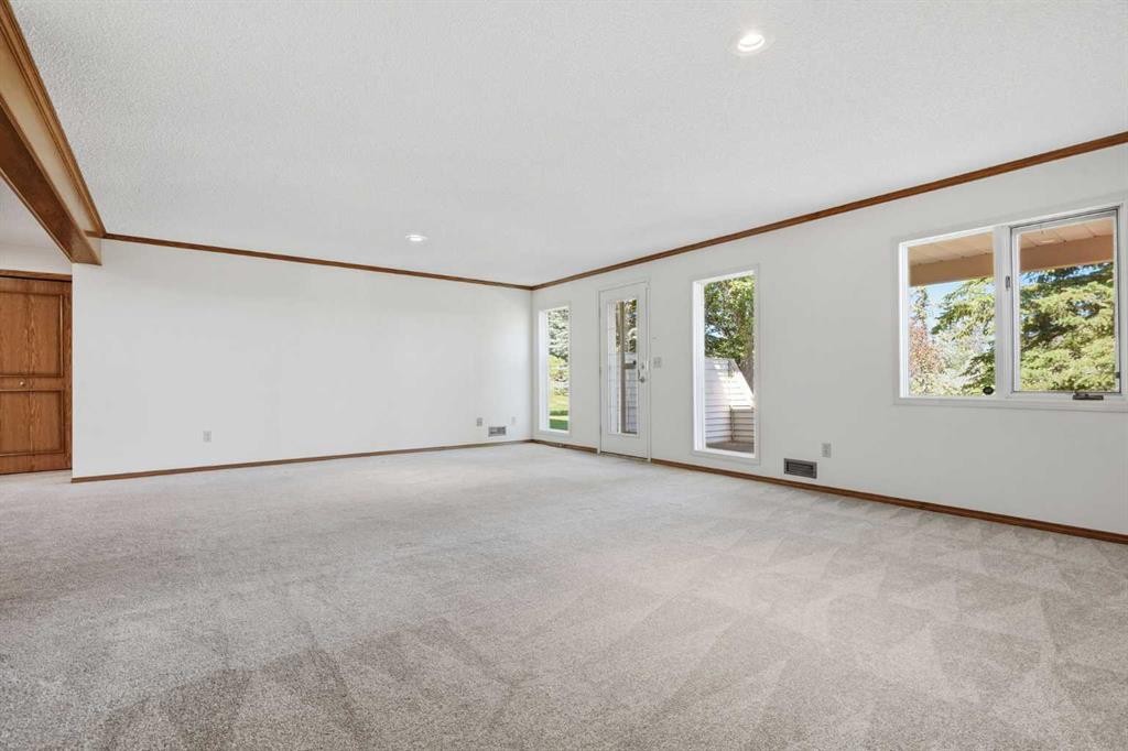 135 Shawnee Rise Sw, Calgary, AB - Indoor Photo Showing Other Room