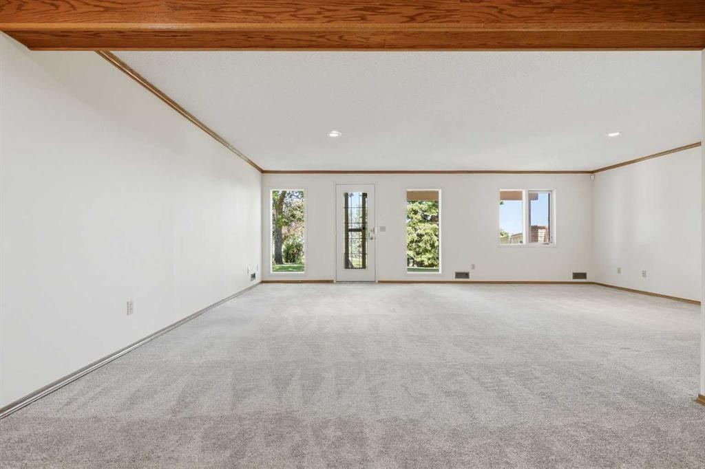 135 Shawnee Rise Sw, Calgary, AB - Indoor Photo Showing Other Room