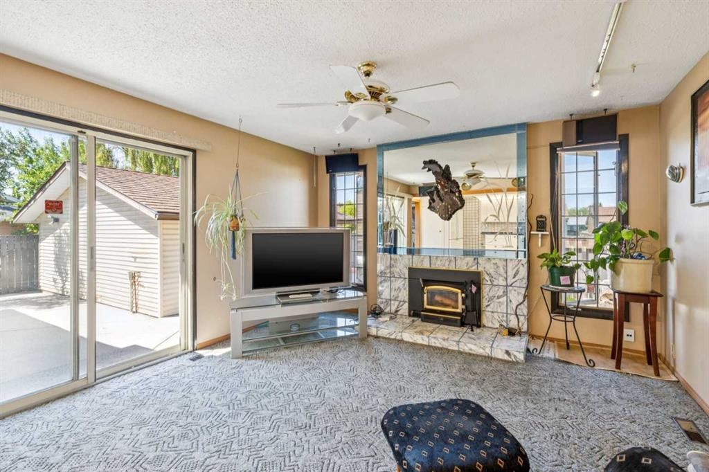 4819 Rundlewood Drive Ne, Calgary, AB - Indoor With Fireplace