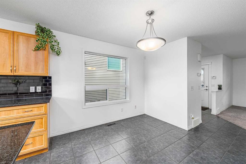 15 Panora Square Nw, Calgary, AB - Indoor Photo Showing Other Room