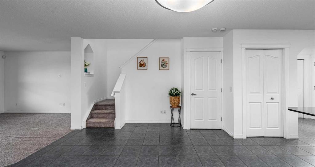 15 Panora Square Nw, Calgary, AB - Indoor Photo Showing Other Room