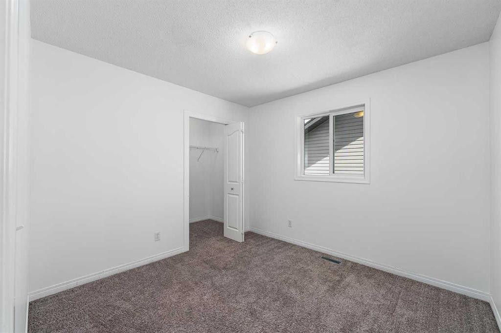 15 Panora Square Nw, Calgary, AB - Indoor Photo Showing Other Room