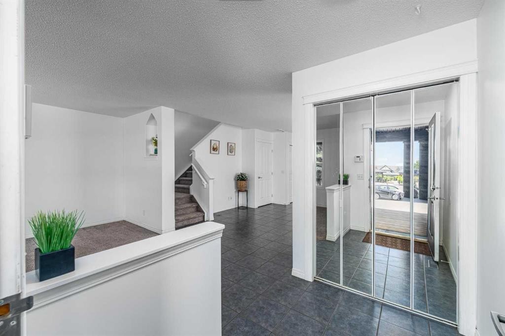 15 Panora Square Nw, Calgary, AB - Indoor Photo Showing Other Room