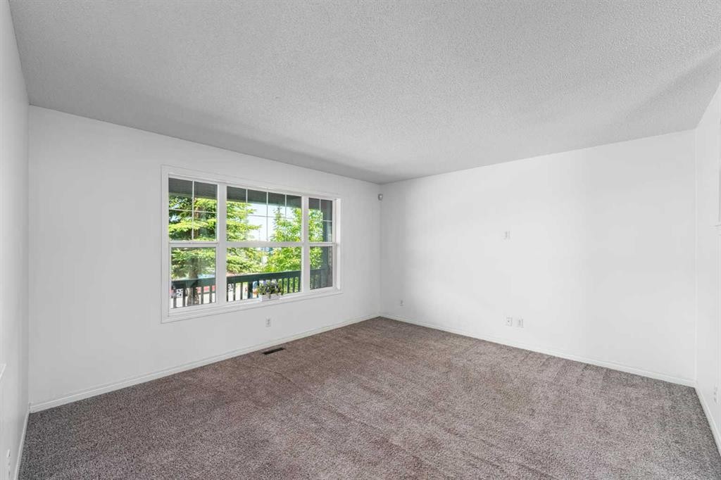 15 Panora Square Nw, Calgary, AB - Indoor Photo Showing Other Room