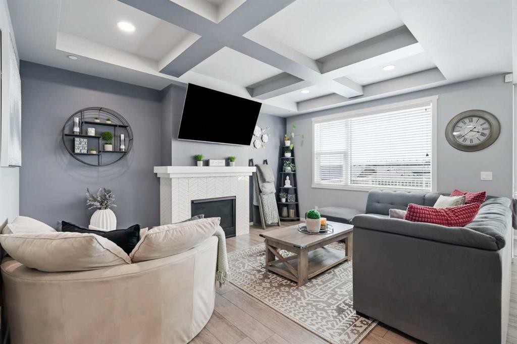 206 Lucas Crescent Nw, Calgary, AB - Indoor Photo Showing Living Room With Fireplace