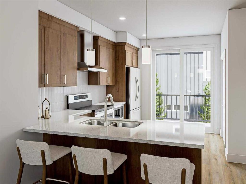 69 Mercado Lane Se, Calgary, AB - Indoor Photo Showing Kitchen With Double Sink With Upgraded Kitchen