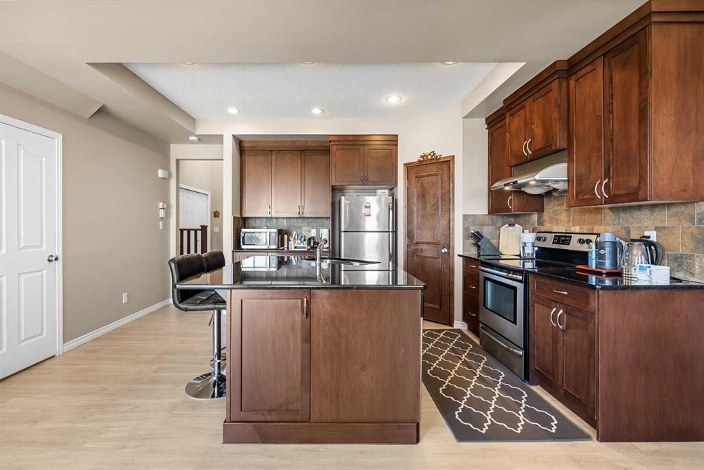 32 Panatella Common Nw, Calgary, AB - Indoor Photo Showing Kitchen With Stainless Steel Kitchen