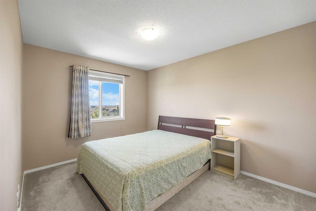 32 Panatella Common Nw, Calgary, AB - Indoor Photo Showing Bedroom