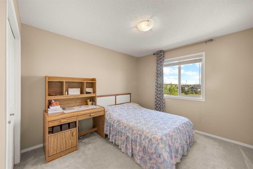 32 Panatella Common Nw, Calgary, AB - Indoor Photo Showing Bedroom
