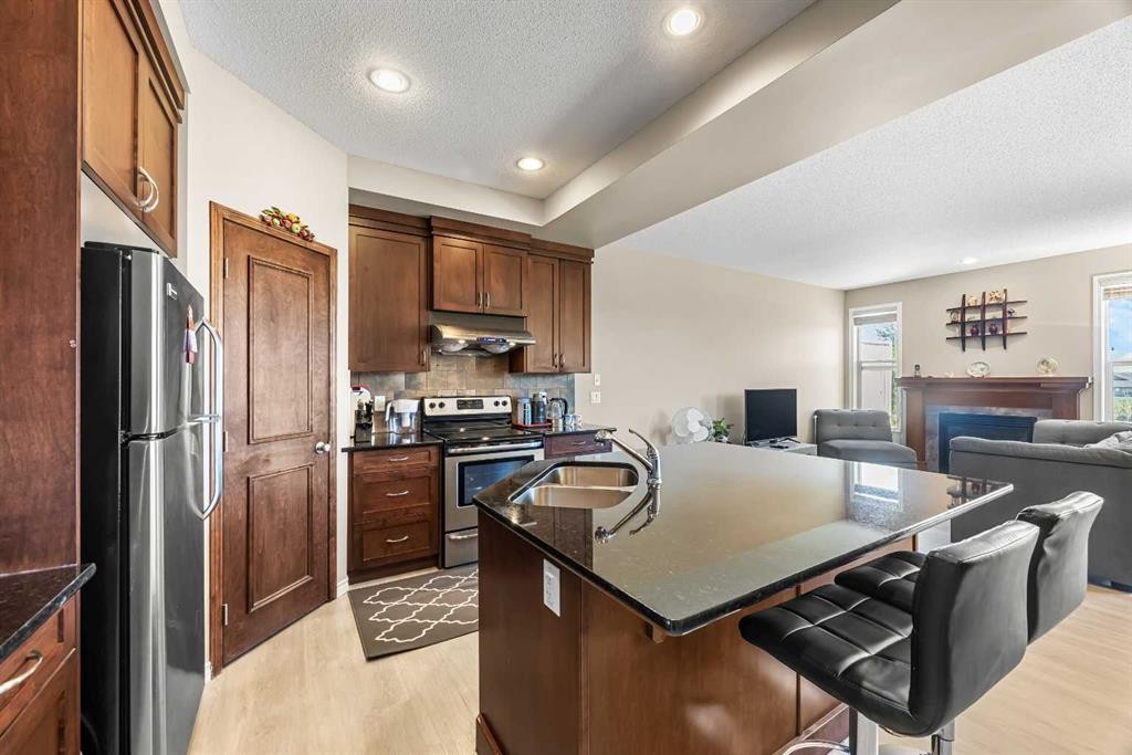 32 Panatella Common Nw, Calgary, AB - Indoor Photo Showing Kitchen With Stainless Steel Kitchen