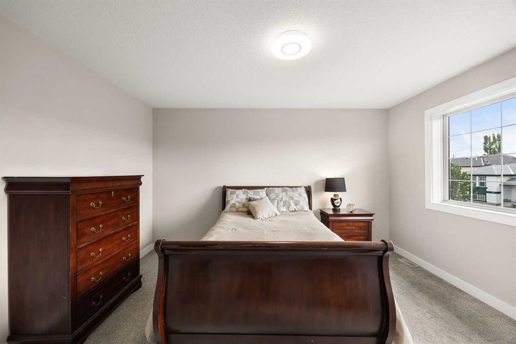 223 Coventry Road Ne, Calgary, AB - Indoor Photo Showing Bedroom
