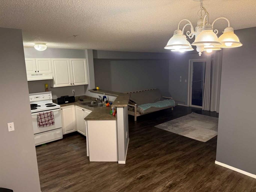 310-60 Lawford Avenue, Red Deer, AB - Indoor Photo Showing Kitchen With Double Sink
