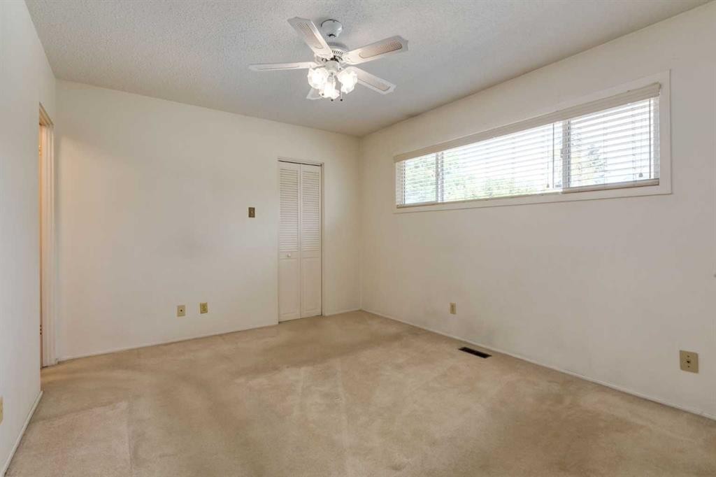 228 Maple Court Crescent Se, Calgary, AB - Indoor Photo Showing Other Room