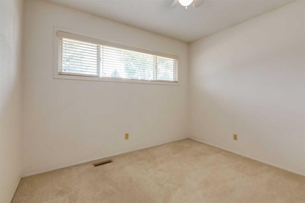 228 Maple Court Crescent Se, Calgary, AB - Indoor Photo Showing Other Room