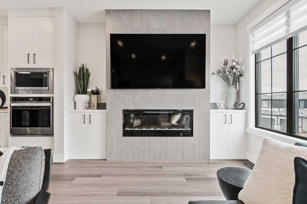 138 Discovery Drive Sw, Calgary, AB - Indoor Photo Showing Living Room With Fireplace
