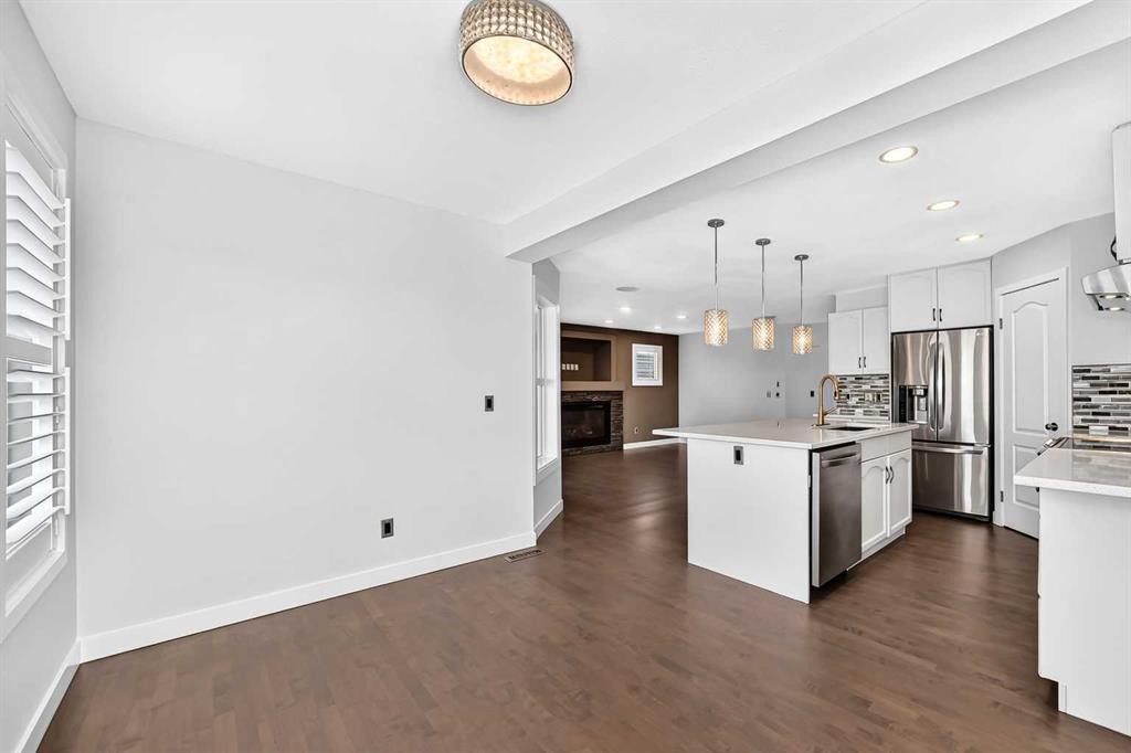 98 Panamount Villas Nw, Calgary, AB - Indoor Photo Showing Kitchen With Upgraded Kitchen
