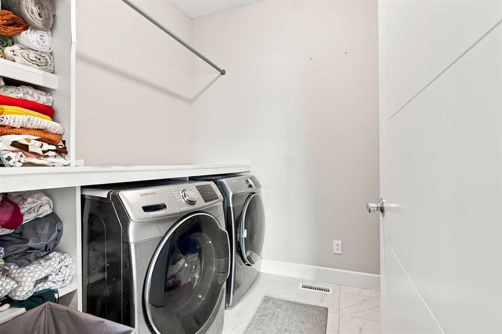 12 Cityside Common Ne, Calgary, AB - Indoor Photo Showing Laundry Room