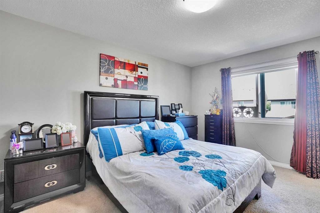 1239 Brightoncrest Green Se, Calgary, AB - Indoor Photo Showing Bedroom