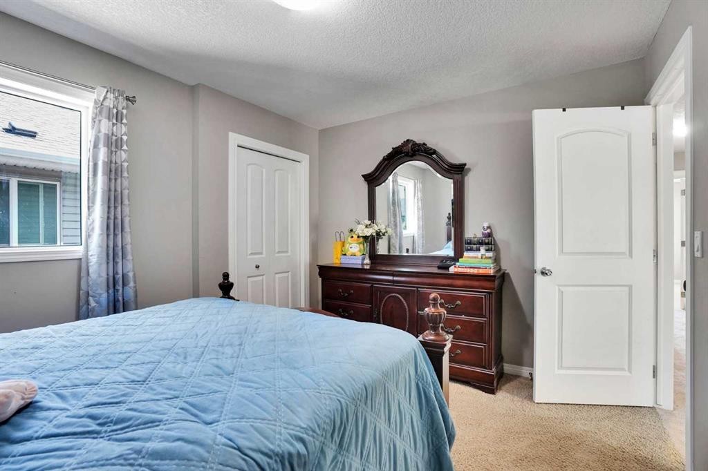1239 Brightoncrest Green Se, Calgary, AB - Indoor Photo Showing Bedroom