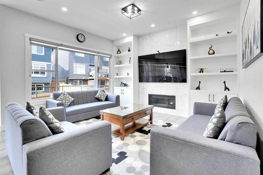 36 Waterford Terrace, Chestermere, AB - Indoor Photo Showing Living Room With Fireplace