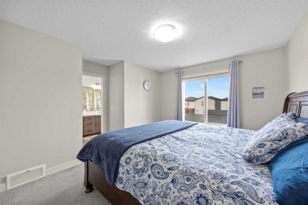 867 Walgrove Boulevard Se, Calgary, AB - Indoor Photo Showing Bedroom