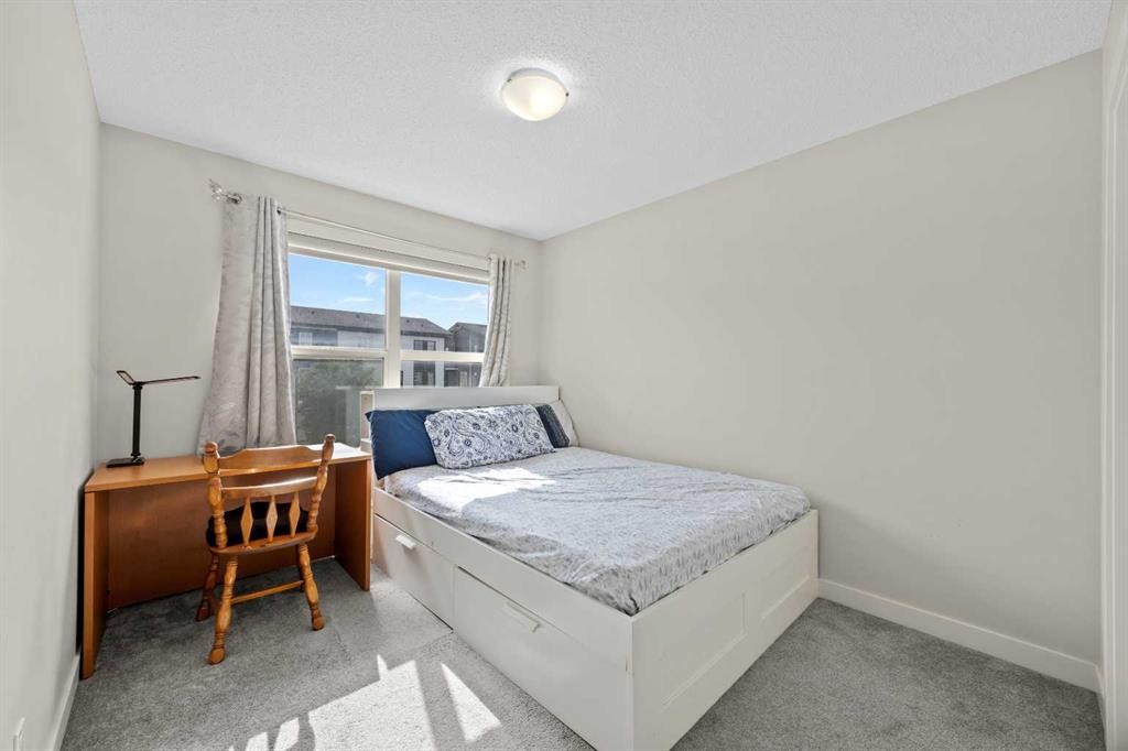 867 Walgrove Boulevard Se, Calgary, AB - Indoor Photo Showing Bedroom