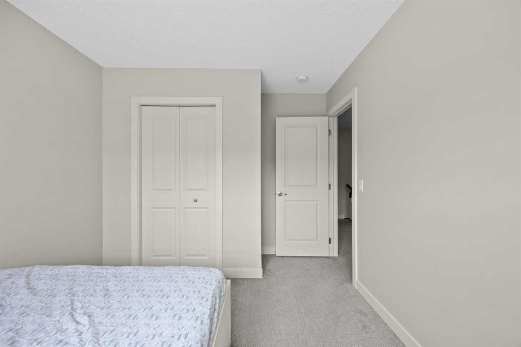 867 Walgrove Boulevard Se, Calgary, AB - Indoor Photo Showing Bedroom