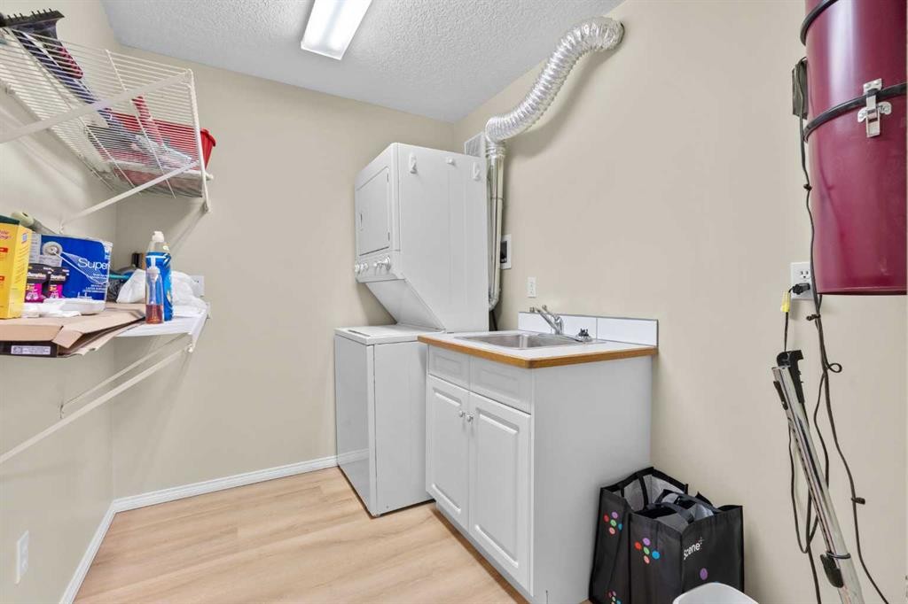 1203-1818 Simcoe Boulevard Sw, Calgary, AB - Indoor Photo Showing Laundry Room