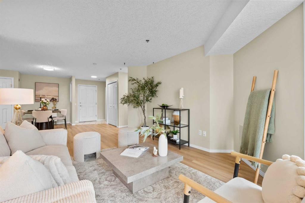 1203-1818 Simcoe Boulevard Sw, Calgary, AB - Indoor Photo Showing Living Room