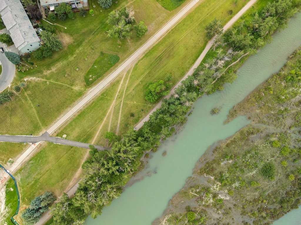 401-145 Point Drive Nw, Calgary, AB - Outdoor With Body Of Water With View