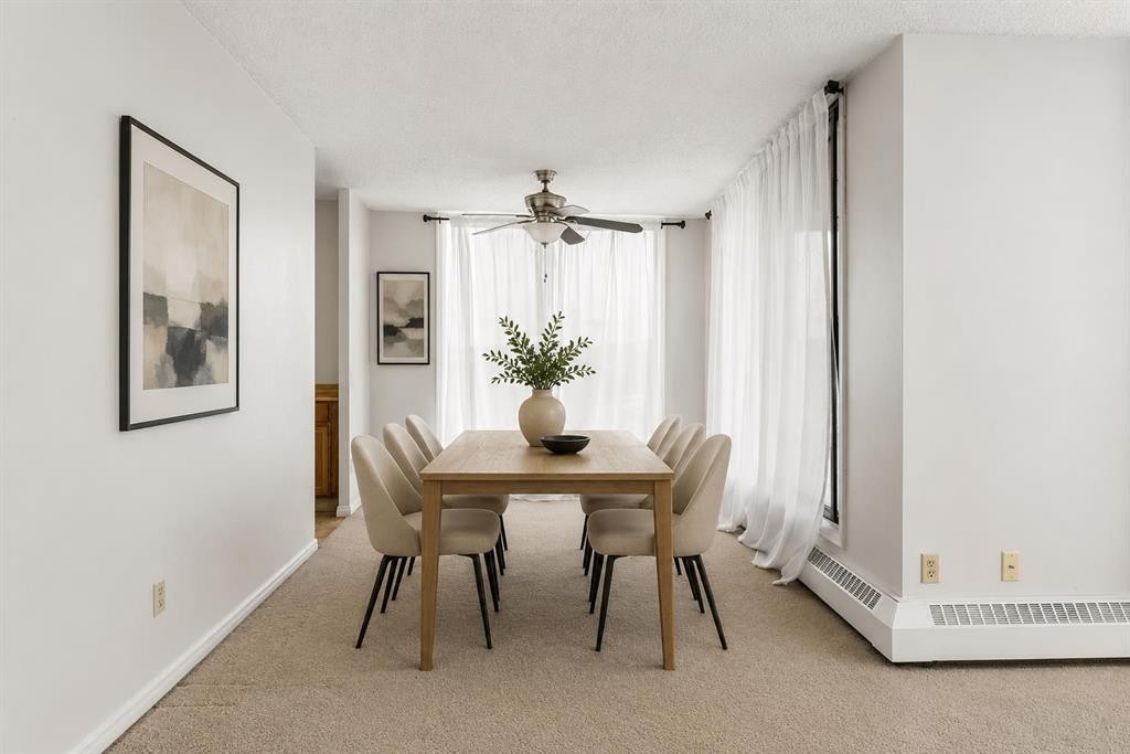 401-145 Point Drive Nw, Calgary, AB - Indoor Photo Showing Dining Room